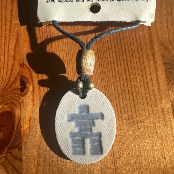 Handmade Inuit Necklace made in British Columbia, Canada- “Inuksuk.” - Picture 2 of 3
